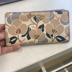 Kate Spade, slim, bi-fold wallet.